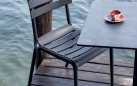 Krzesło OLBIA ogrodowe z polipropylenu bez podłokietników ciemnoszare – horeca