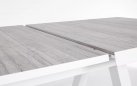 Aluminiowy biały stół na taras z blatem ceramicznym jasnoszarym KRION 205-265