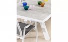 Aluminiowy biały stół na taras z blatem ceramicznym jasnoszarym KRION 205-265