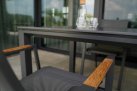 Aluminiowe krzesło ogrodowe stołowe grafitowe sztaplowane TARRAGONA Teak