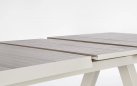 Aluminiowy jasnobeżowy stół na taras z blatem ceramicznym beżowym KRION 163-203 cm
