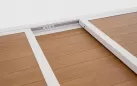 Biały ogrodowy stół aluminiowy rozkładany z blatem imitacja drewna 140-210 HILIJA bizzotto