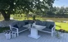 Biały luksusowy narożnik aluminiowy TIMBER z podnoszonym stolikiem z blatem kamiennym
