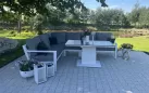 Biały luksusowy narożnik aluminiowy TIMBER z podnoszonym stolikiem z blatem kamiennym